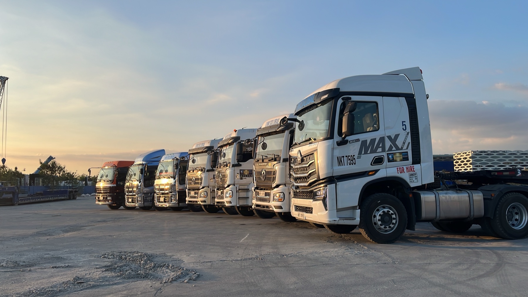 LinksGlobal trucks lined up at sunset